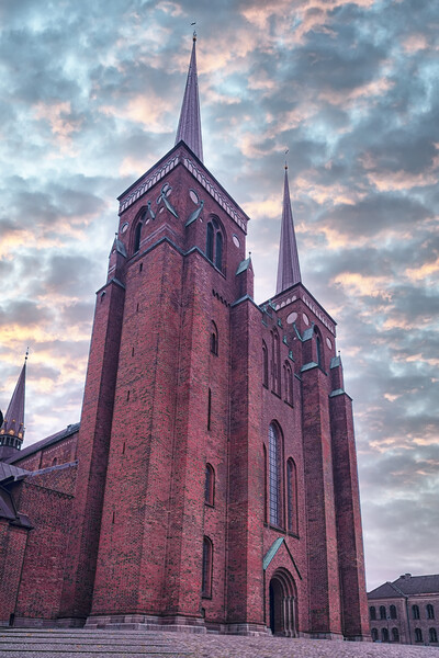 Roskilde Cathedral with Dramatic Sky Picture Board by Antony McAulay