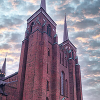 Buy canvas prints of Roskilde Cathedral with Dramatic Sky by Antony McAulay