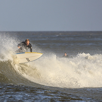 Buy canvas prints of  Surfer at Lynmouth by David Morton