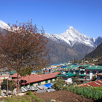 Buy canvas prints of Lukla with Nupla in the background by David Morton