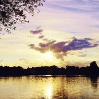 Buy canvas prints of  Sunset Over U.E.A Lake, Norwich, England by Vincent J. Newman