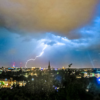 Buy canvas prints of Lightning over Norwich, U.K by Vincent J. Newman