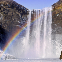 Buy canvas prints of Skogafoss waterfall in Iceland. by richard pereira