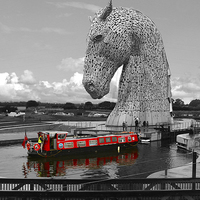Buy canvas prints of The Majestic Kelpie and the Red Barge by Jane Braat