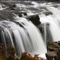 Buy canvas prints of  Powerful waterfall in Glen Coe by Jane Braat