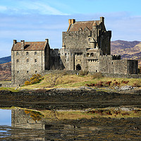 Buy canvas prints of Majestic Eilean Donan Castle in the Scottish Highl by Jane Braat