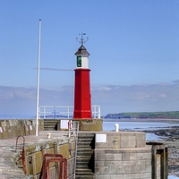 Buy canvas prints of Watchet Harbour Light by Paul Williams