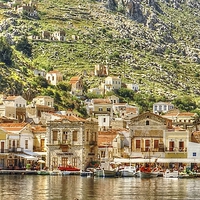 Buy canvas prints of Symi Harbour by Paul Williams