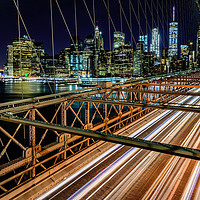 Buy canvas prints of Brooklyn Bridge New York City At Night by Chris Curry