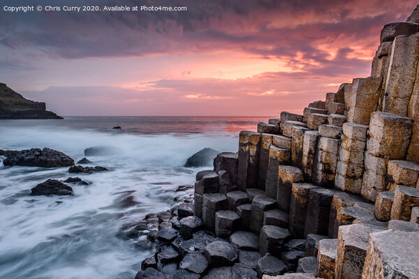 Firey Sunset Giants Causeway County Antrim Northern Ireland Picture Board by Chris Curry