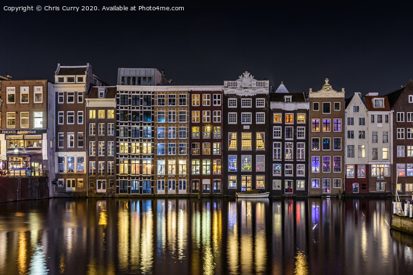 Amsterdam Canals Damrak At Night Cityscape Picture Board by Chris Curry