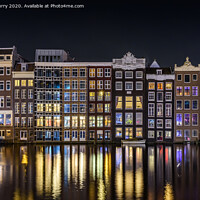 Buy canvas prints of Amsterdam Canals Damrak At Night Cityscape by Chris Curry
