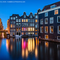 Buy canvas prints of Amsterdam Night Reflections Canal Houses by Chris Curry