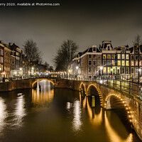 Buy canvas prints of Amsterdam At Night Keizersgracht Canal by Chris Curry