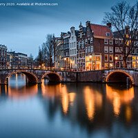 Buy canvas prints of Amsterdam City Lights At Twilight Keizersgracht Canal by Chris Curry
