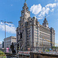 Buy canvas prints of Royal Liver Building and Liverpool Blitz Monument by Dave Wood
