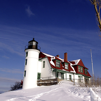 Buy canvas prints of Winter Lighthouse by Ian Pettman