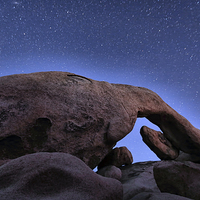 Buy canvas prints of  Arch Rock Under The Stars by Stephen Stookey