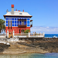Buy canvas prints of Blue House at the Seaside by Gisela Scheffbuch
