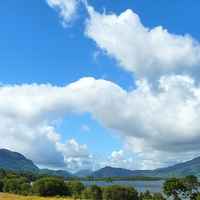 Buy canvas prints of Clouds above Lough Leane by Gisela Scheffbuch