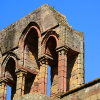 Buy canvas prints of  Jedburgh Abbey - Detail by Gisela Scheffbuch