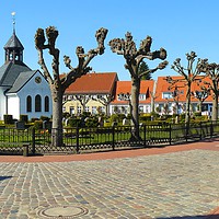 Buy canvas prints of Ancient Fishing Village in the City of Schleswig by Gisela Scheffbuch