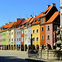 Buy canvas prints of Historic Merchant Houses in Poznań by Gisela Scheffbuch