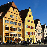 Buy canvas prints of The Market Square of Rothenburg ob der Tauber by Gisela Scheffbuch