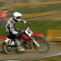 Buy canvas prints of Speed - Motocross rider in action by Matthias Hauser