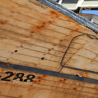 Buy canvas prints of Boat Under Repair by Jonathan Parkes