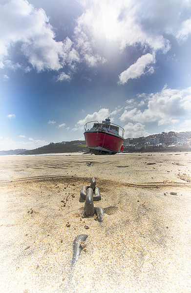 Boat at low tide Picture Board by sean clifford