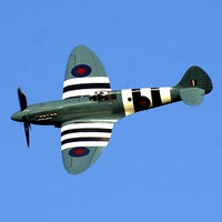 Buy canvas prints of Spitfire Flying High by Peter Farrington