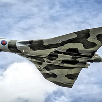 Buy canvas prints of  High In The Sky Vulcan XH558 by Peter Farrington