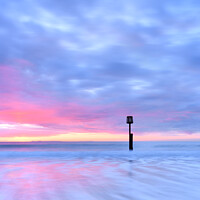 Buy canvas prints of Solitude on Swanage beach  by Shaun Jacobs