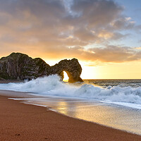 Buy canvas prints of Sunrise through the arch of Durdle Door  by Shaun Jacobs