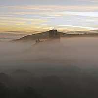 Buy canvas prints of Corfe Castle in the Mist by Shaun Jacobs