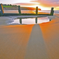 Buy canvas prints of Sunrise over Yaverland beach by Shaun Jacobs
