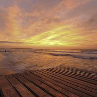 Buy canvas prints of  Sunrise over a jetty  by Shaun Jacobs