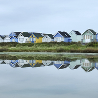 Buy canvas prints of  Beach huts reflected  by Shaun Jacobs
