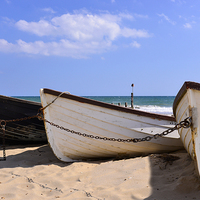 Buy canvas prints of  Fishing boats on the beach  by Shaun Jacobs
