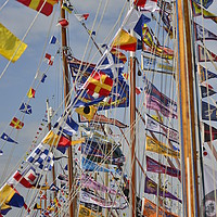 Buy canvas prints of Regatta flags at Cowes week by Shaun Jacobs