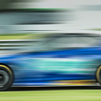 Buy canvas prints of Racing car motion blur  by Shaun Jacobs