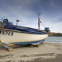 Buy canvas prints of Lulworth cove fishing boat  by Shaun Jacobs