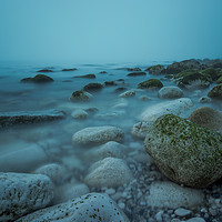 Buy canvas prints of Rocks on the Beach on a misty morning by Shaun Jacobs