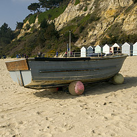 Buy canvas prints of Fishing boat on Bournemouth beach by Shaun Jacobs