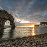 Buy canvas prints of Durdle Door sunset  by Shaun Jacobs