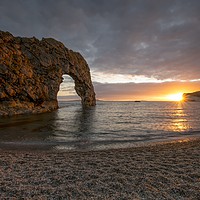 Buy canvas prints of Durdle Door bathed by the sun  by Shaun Jacobs