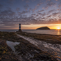 Buy canvas prints of Penmon lighthouse at sunrise  by Shaun Jacobs