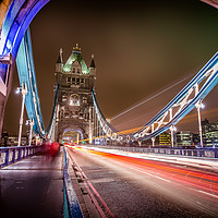 Buy canvas prints of Tower Bridge - Lights passing by. by Kelvin Trundle