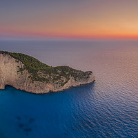 Buy canvas prints of Navagio Beach - Shipwreck Cove at sunset by Kelvin Trundle
